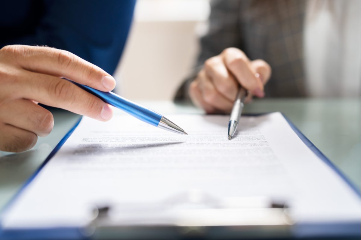 people going over paperwork