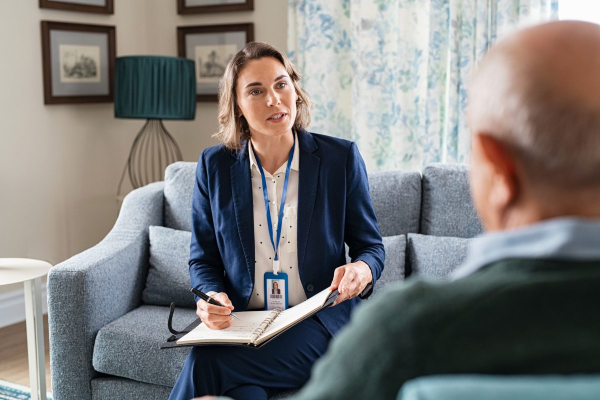 Case manager meeting with a client to coordinate referrals
