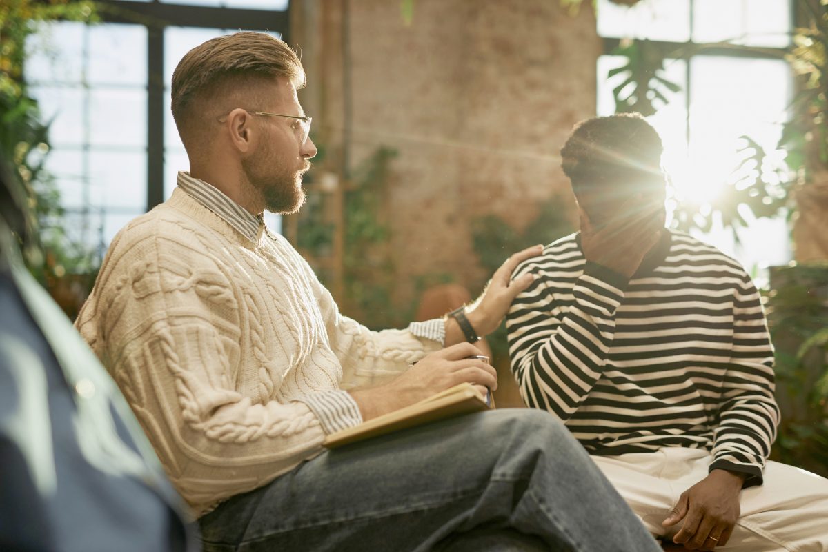 Psychologist in session with a client before writing psychologist notes